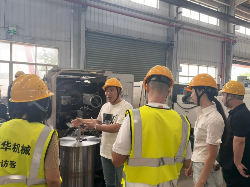 Hitachi procurement leaders visit Hehua Machinery for transformer manufacturing exchange