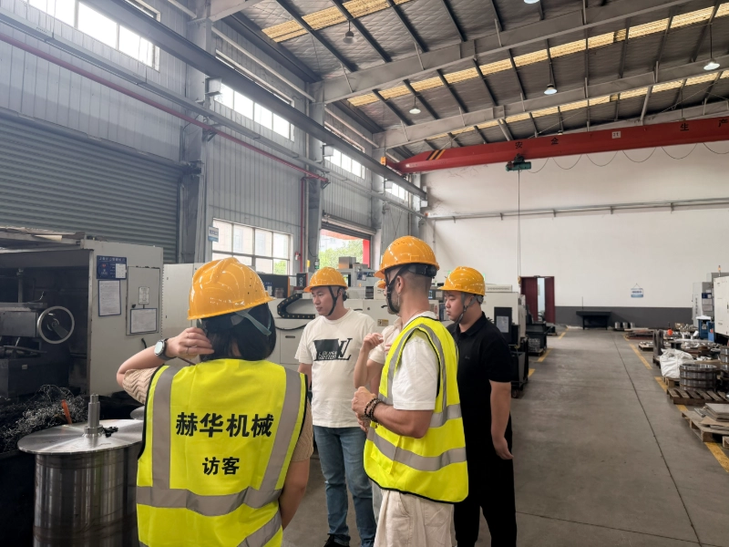 Hitachi procurement leaders visit Hehua Machinery for transformer manufacturing exchange